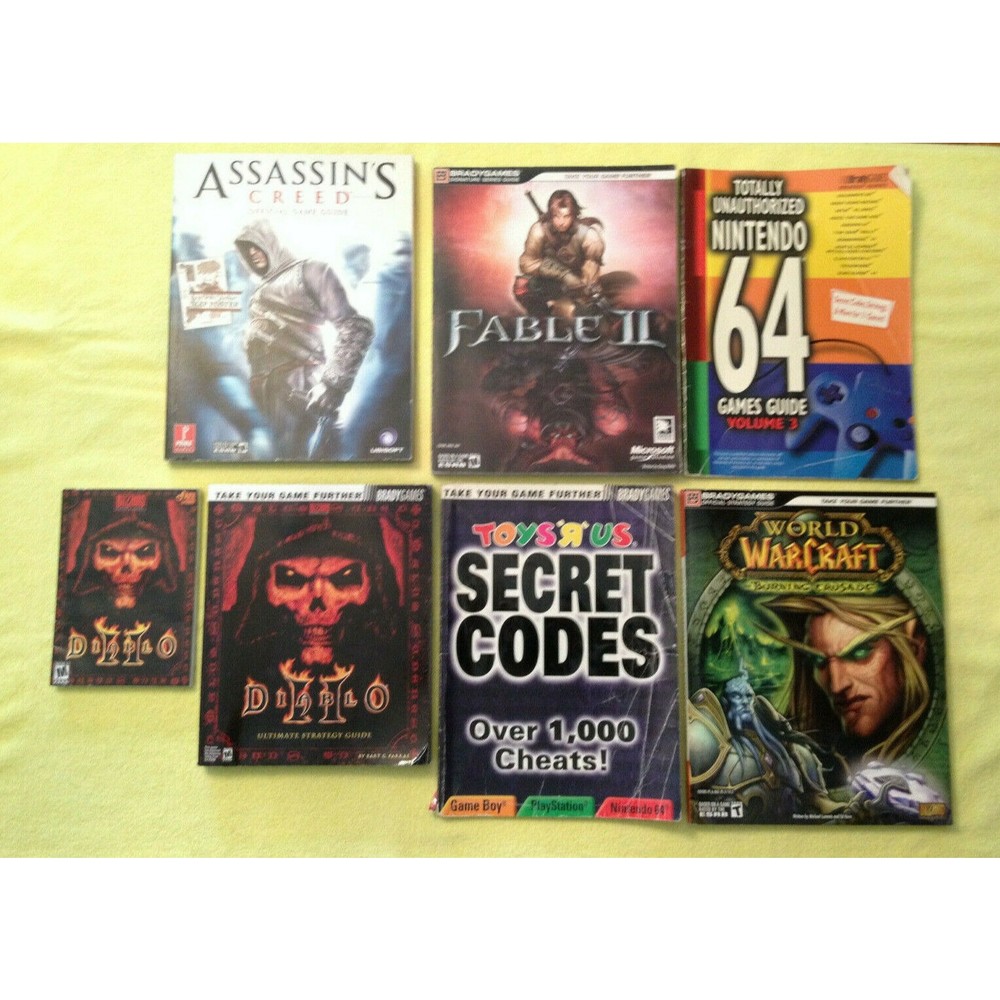 7-Game Books, Diablo 2, Assassin's Creed,Fable 2,Warcraft, Secret Codes Nintendo